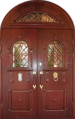 Стальная арочная дверь со стеклом и ковкой ДА-30 в дом из кирпича в Сергиевом Посаде