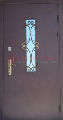 Металлическая дверь со стеклом и ковкой ДСК-77 в панельный дом в Йошкар-Оле