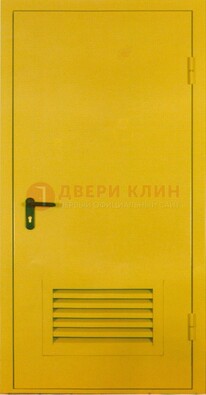 Желтая металлическая противопожарная дверь с вентиляционной решеткой ДТ-15 в Сургуте